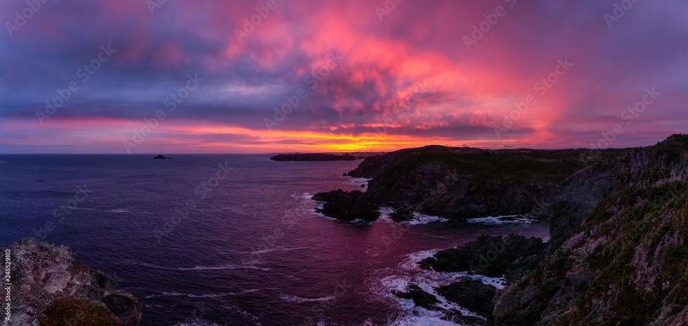 Striking panoramic seascape view on a rocky Atlantic Ocean Coast during a colorful sunrise. Taken at Crow Head, North Twillingate Island, Newfoundland and Labrador, Canada. Striking panoramic seascape view on a rocky Atlantic Ocean Coast during a colorful sunrise. Taken at Crow Head, North Twillingate Island, Newfoundland and Labrador, Canada.