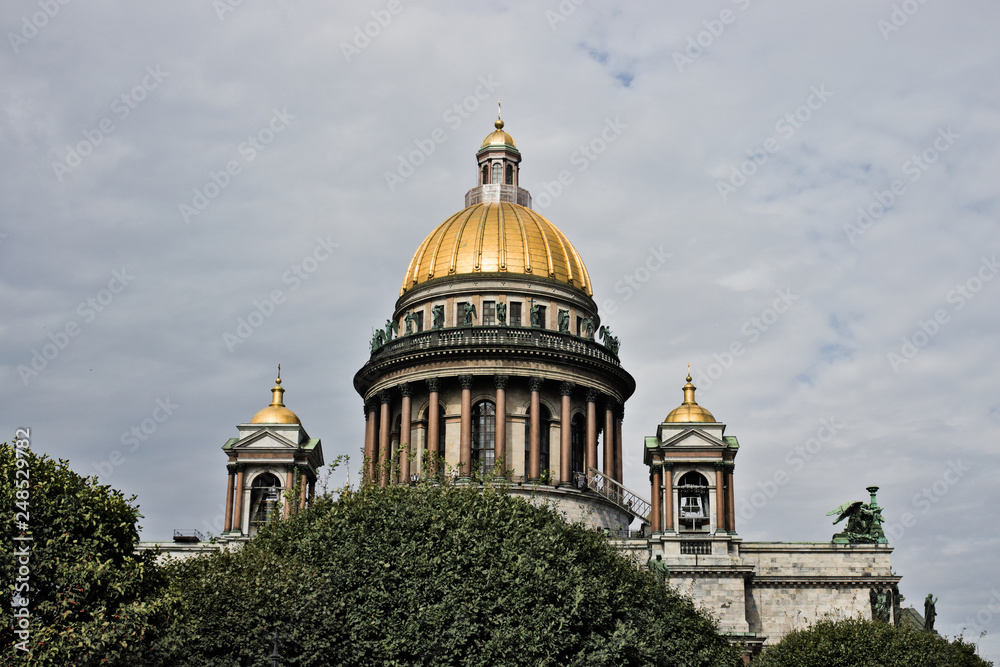 Saint Isaac's Cathedral in St. Petersburg with bushes, Russia.