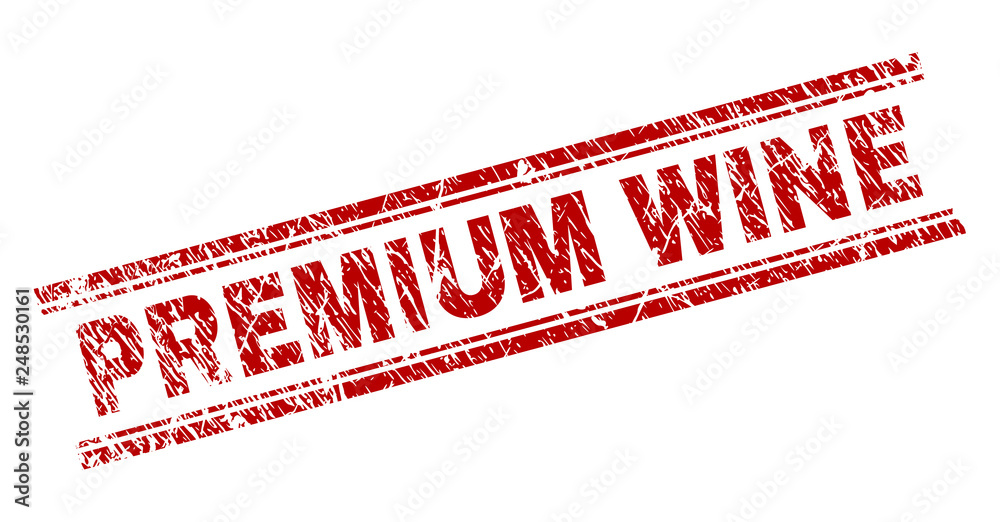 PREMIUM WINE seal print with corroded texture. Red vector rubber print of PREMIUM WINE caption with dirty texture. Text caption is placed between double parallel lines.