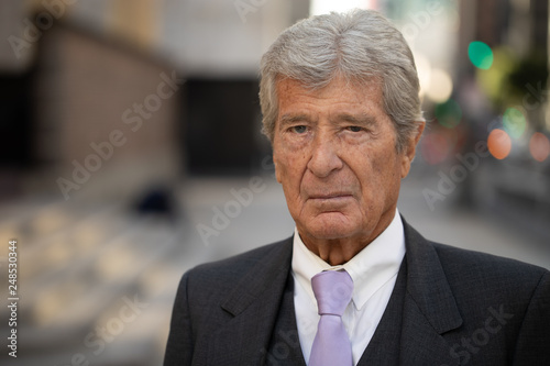 Senior businessman in city serious angry face © blvdone