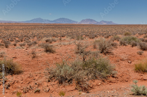 scenic view of Henry Mountains from the sandy desert of southern Utah