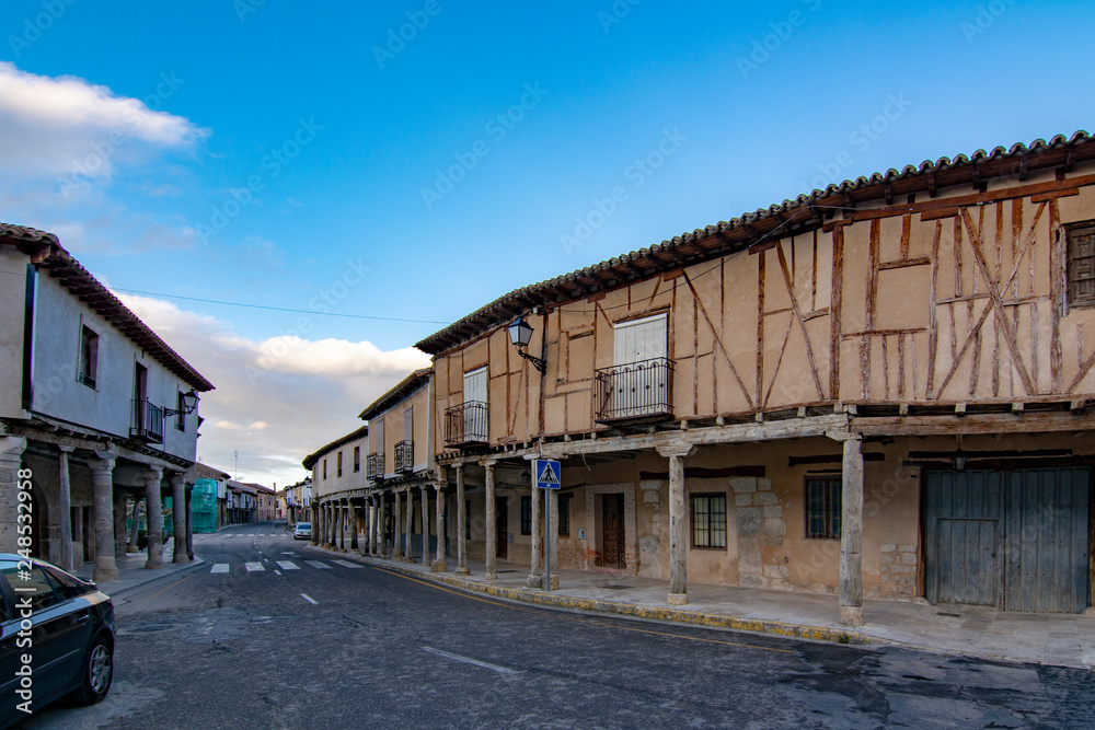 Street with arcades in Ampudia, Palencia