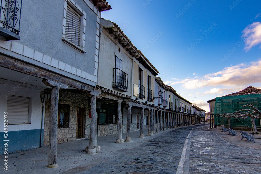 Street with arcades in Ampudia, Palencia
