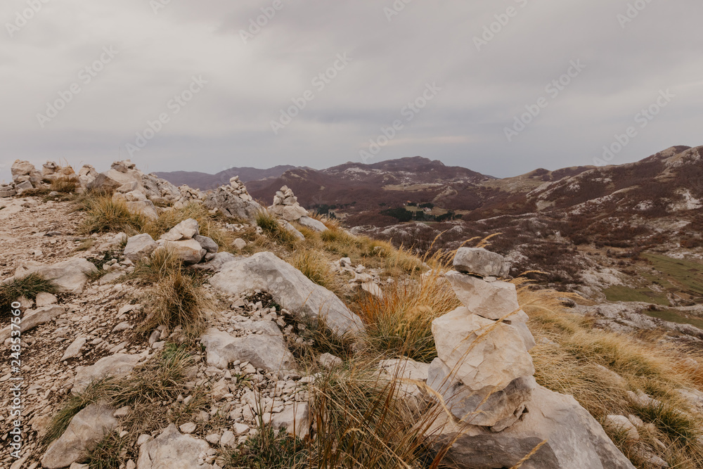 Fototapeta premium Panoramic view of the highest peaks of the Lovcen mountain national park in southwestern Montenegro. - Image.
