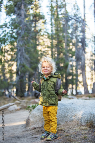 Fototapeta Naklejka Na Ścianę i Meble -  Hiker toddler boy visit Yosemite national park in California