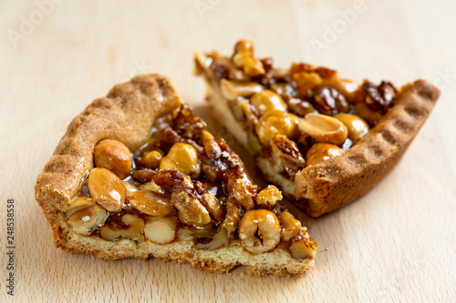 Two slices of tart with nuts