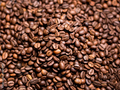 Coffee Background. roasted coffee beans, top view, Represent breakfast, energy, freshness or great aroma