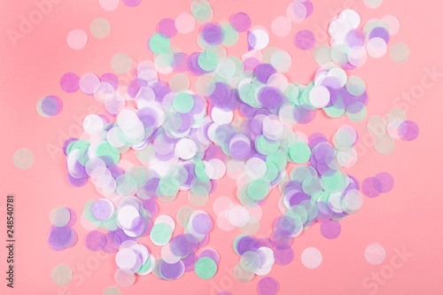 Pink background with confetti.