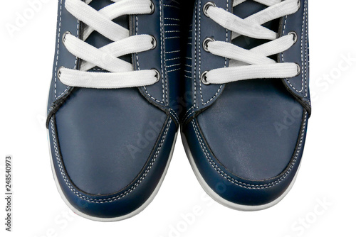 Urban style leather shoes with white shoelaces close up on a white background