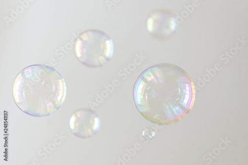 Photo of soap bubbles  creative background  selective focus