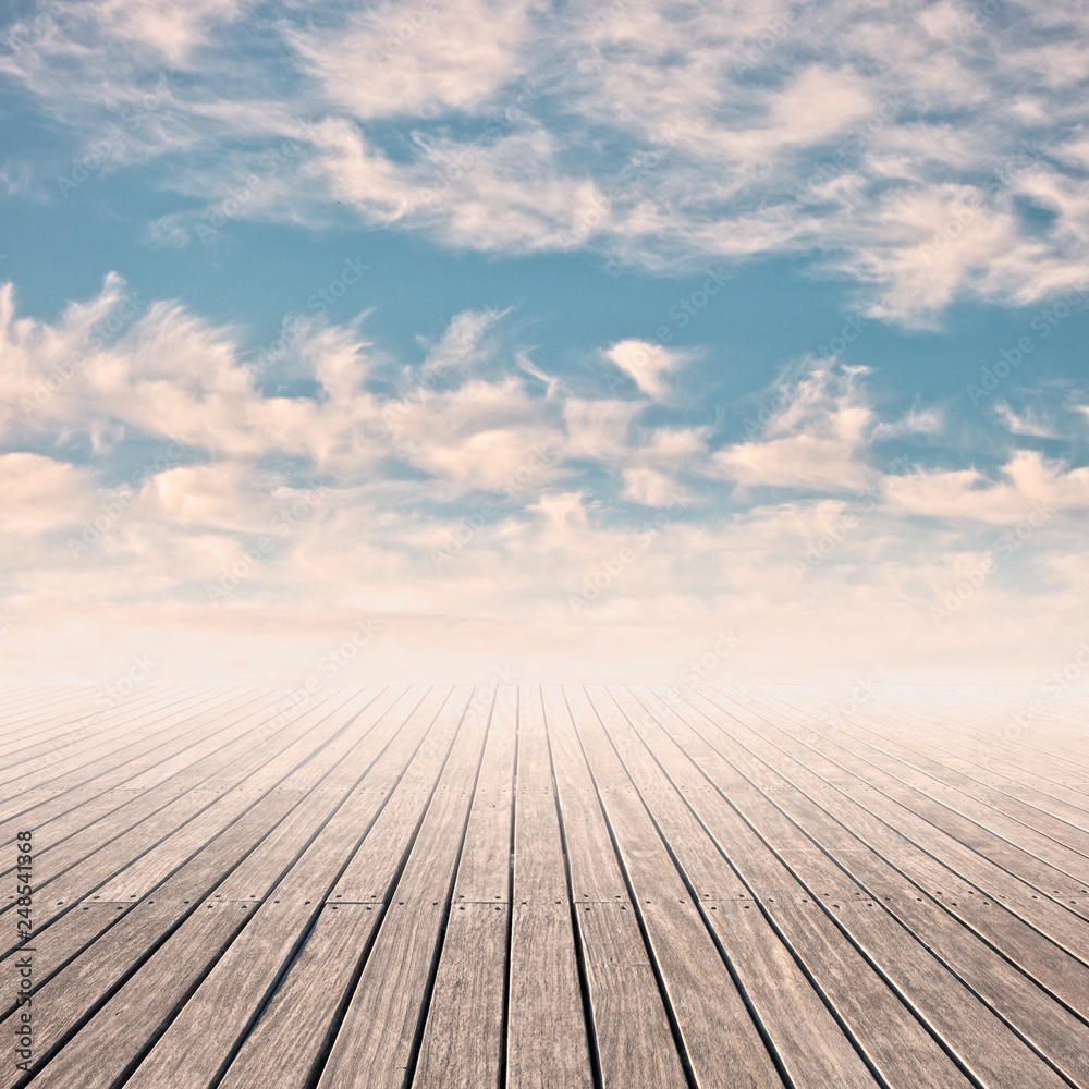 pier in a cloudy blue sky on sunset