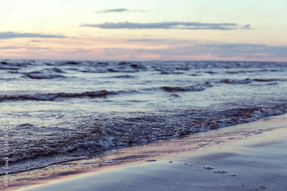 Seashore and waves at sunset. Calmness, awareness, the path to yourself. Harmony and life without stress Seashore and waves at sunset. Calmness, awareness, the path to yourself. Harmony and life without stress