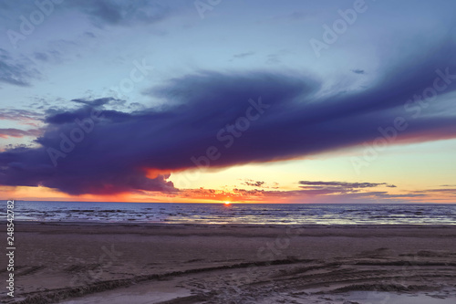 Seashore and waves at sunset. Calmness, awareness, the path to yourself. Harmony and life without stress