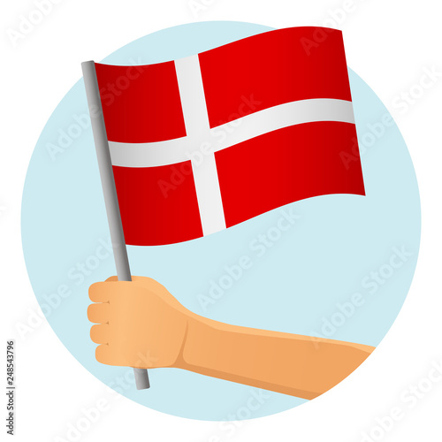 Denmark flag in hand