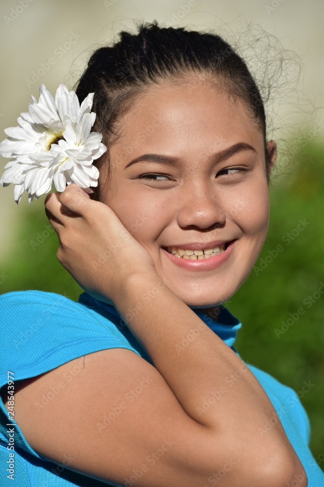 Attractive Minority Adult Female And Happiness With A Daisy Attractive Minority Adult Female And Happiness With A Daisy
