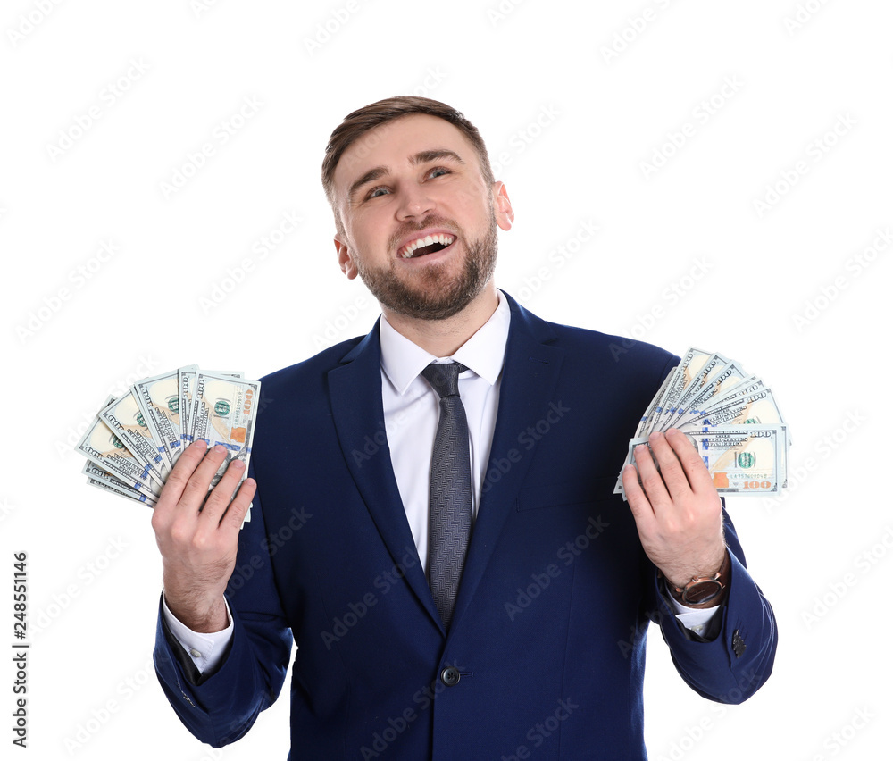 Portrait of young businessman holding money banknotes on white background Portrait of young businessman holding money banknotes on white background