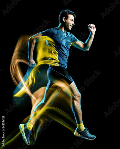 one caucasian runner running jogger jogging man light painting speed effect  isolated on black background © snaptitude