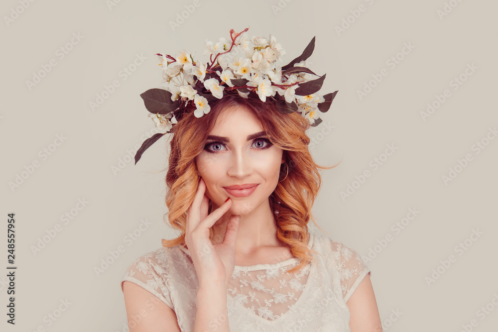 Beautiful young woman wearing floral headband