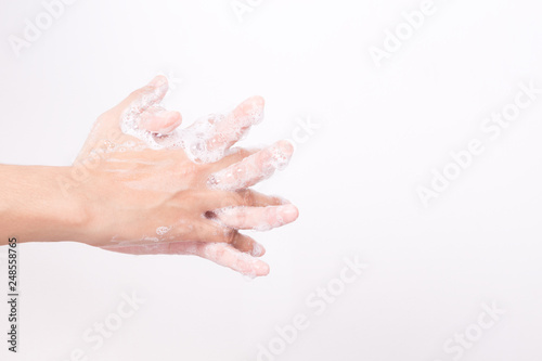 Asian woman hand are washing with soap bubbles on white background, Health and Lifestyle Concepts, Global Handwashing Day