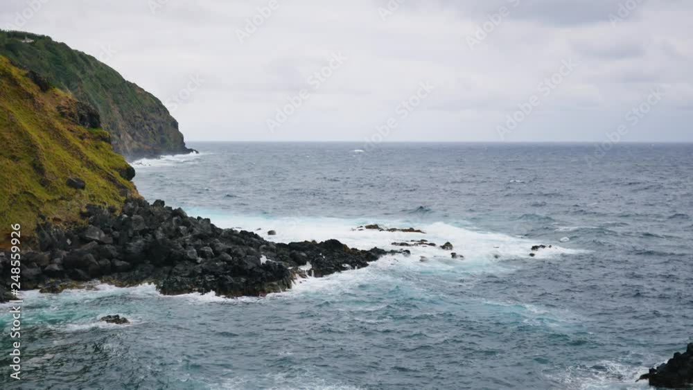 long coastline along a rocky wild coast with a turbulent ocean