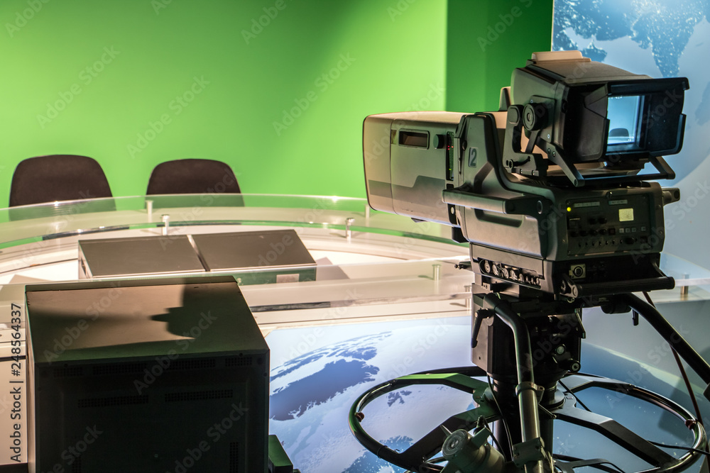 TV studio with professional camera aiming at empty seat, TV news studio  with camera. Stock-Foto | Adobe Stock