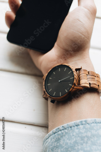 Male hand with wristwatch