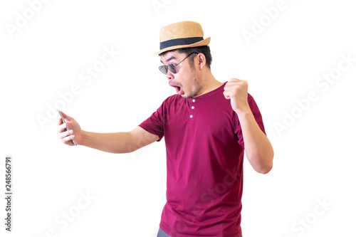 The young man Asian expressed his joyful victory. shopping online on smartphones concept. isolated on white background and clipping path.