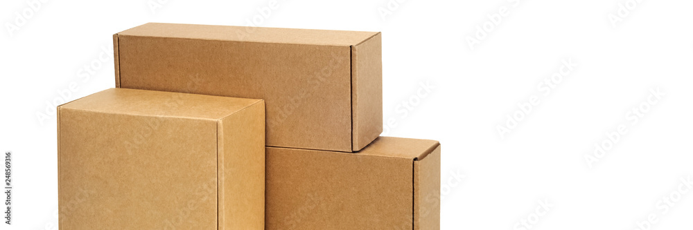 Cardboard boxes for goods on a white background. Different size. Isolated on white background. Cardboard boxes for goods on a white background. Different size. Isolated on white background.