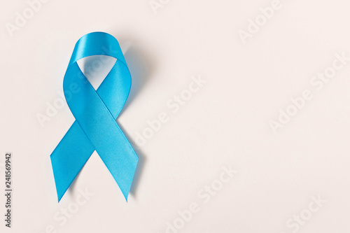 Blue ribbon.  Isolated on white background with empty space for text. Close up.