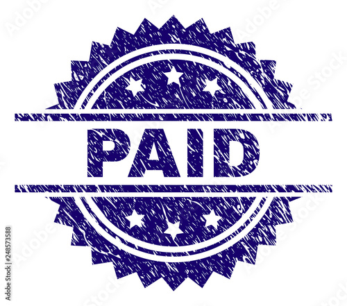 PAID stamp seal watermark with distress style. Blue vector rubber print of PAID text with unclean texture.