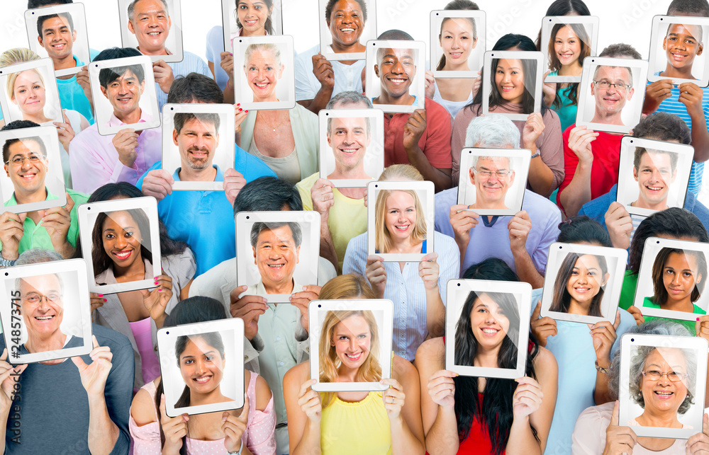 Multi-ethnic casual people holding the tablet Multi-ethnic casual people holding the tablet