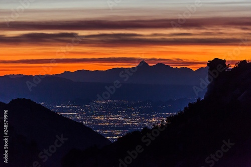 Landscape view of the mountains surrounding Tucson, Arizona during sunset photo