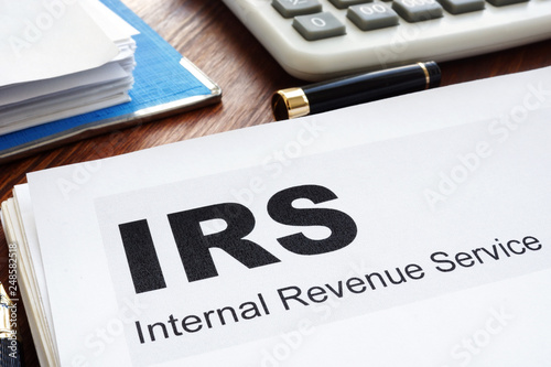 IRS Internal Revenue Service documents and folder. photo