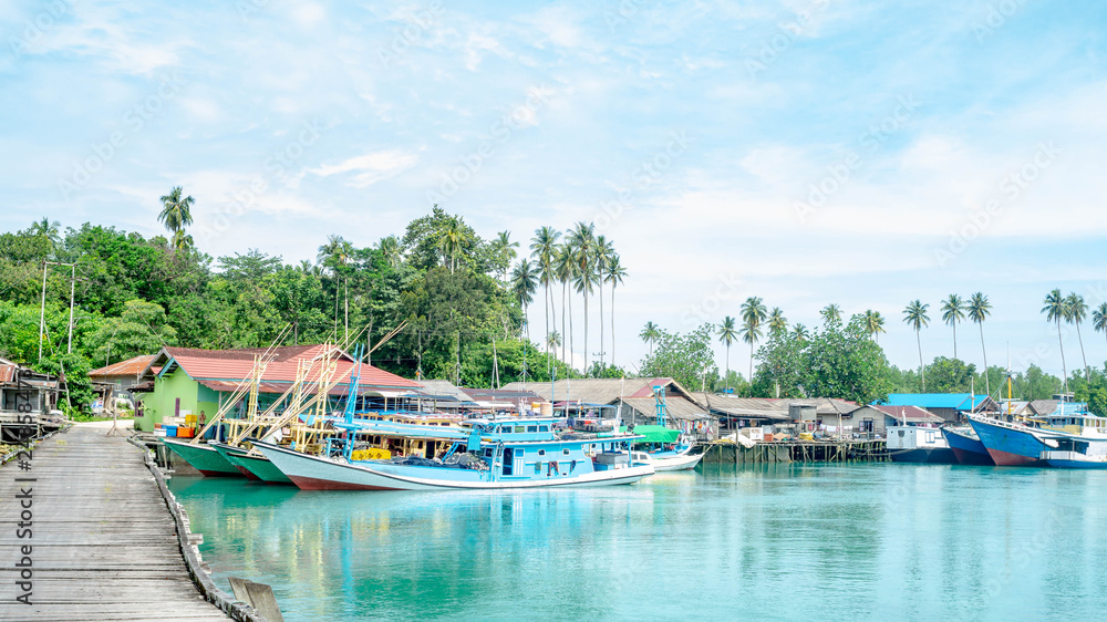 traditional fisherman's boat docked in the harbor, Labuhan cermin, Berau, Indonesia.. Labuhan Cermin is one of tourist resort in Indonesia