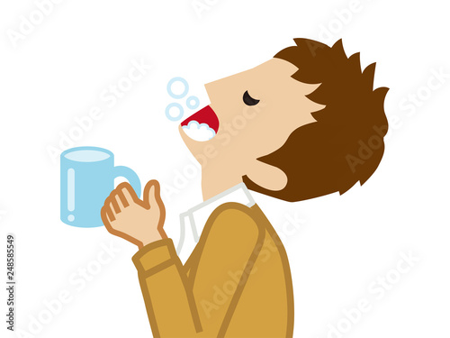 Male student gargling with water for prevent cold