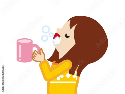 Toddler girl gargling with water for prevent cold