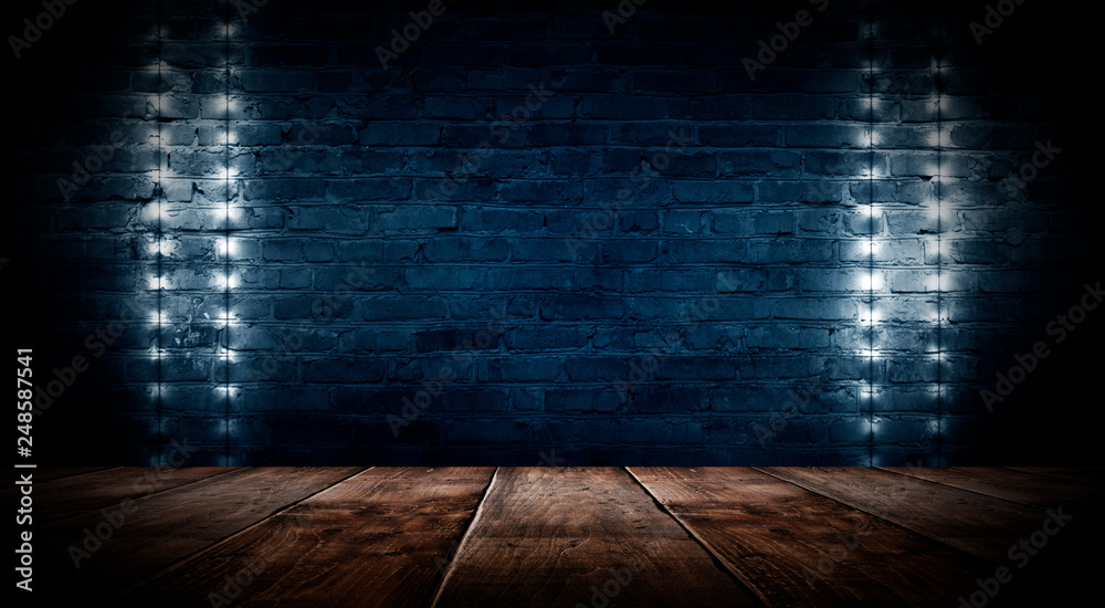 Illumination of an empty brick wall, neon light, smoke. The night scene of an empty room is decorated with abstract light. Night smoke.