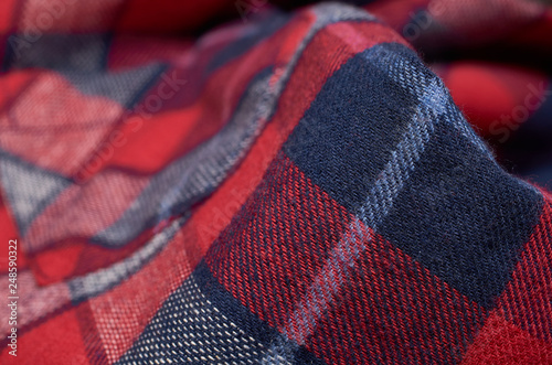 Macro photo of fabric pattern, close up of textile clothing with shallow depth of field