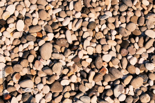 Pebbles and stones from beach background pattern