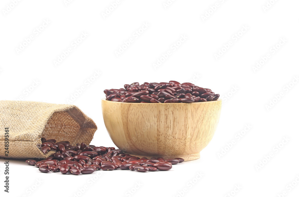 Grains Red bean in wooden bowl and overflow from sack on white background. Grains Red bean in wooden bowl and overflow from sack on white background.