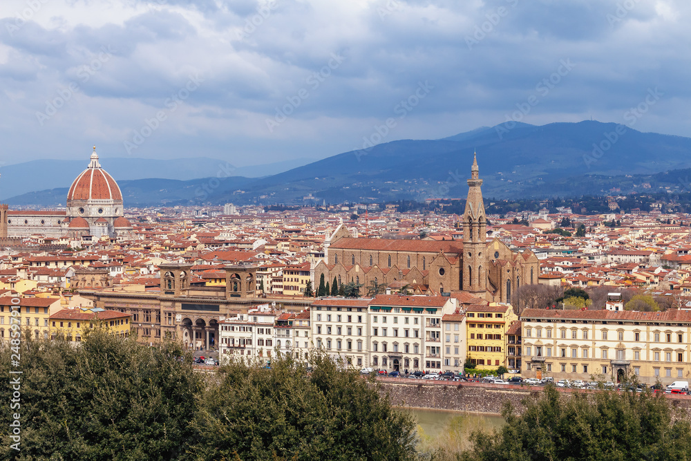 top view of the red tiled roofs and cathedrals of the ancient Italian city of Florence