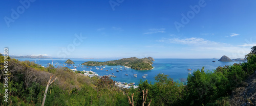 Panoramic blue sky background with white clouds on a sunny day over the sea in flores island, Labuan bajo, Indonesia