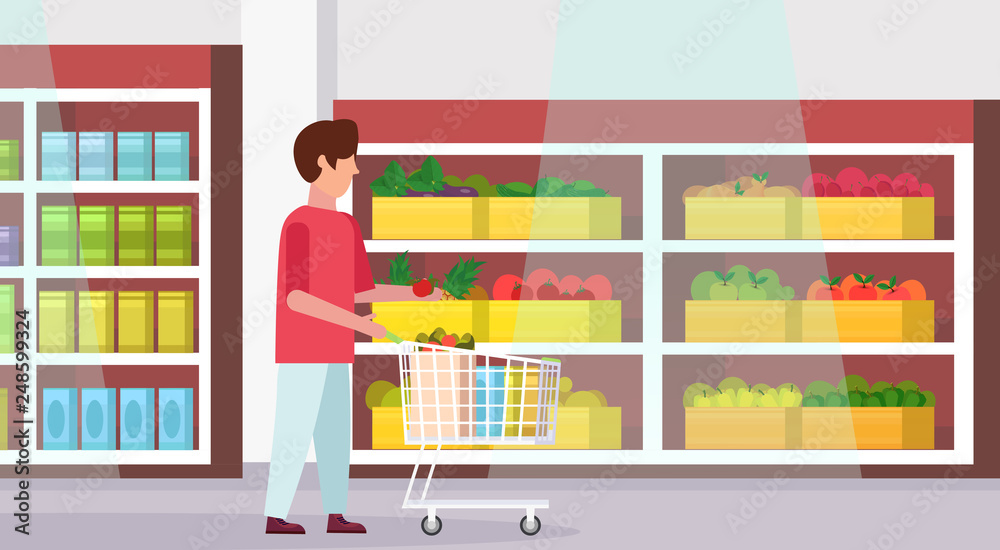 man carrying full trolley cart of food purchases big grocery shop supermarket interior male customer super market shopping concept full length flat horizontal man carrying full trolley cart of food purchases big grocery shop supermarket interior male customer super market shopping concept full length flat horizontal