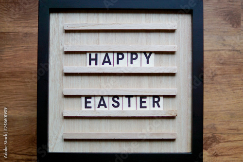 Happy Easter sign with wooden letters