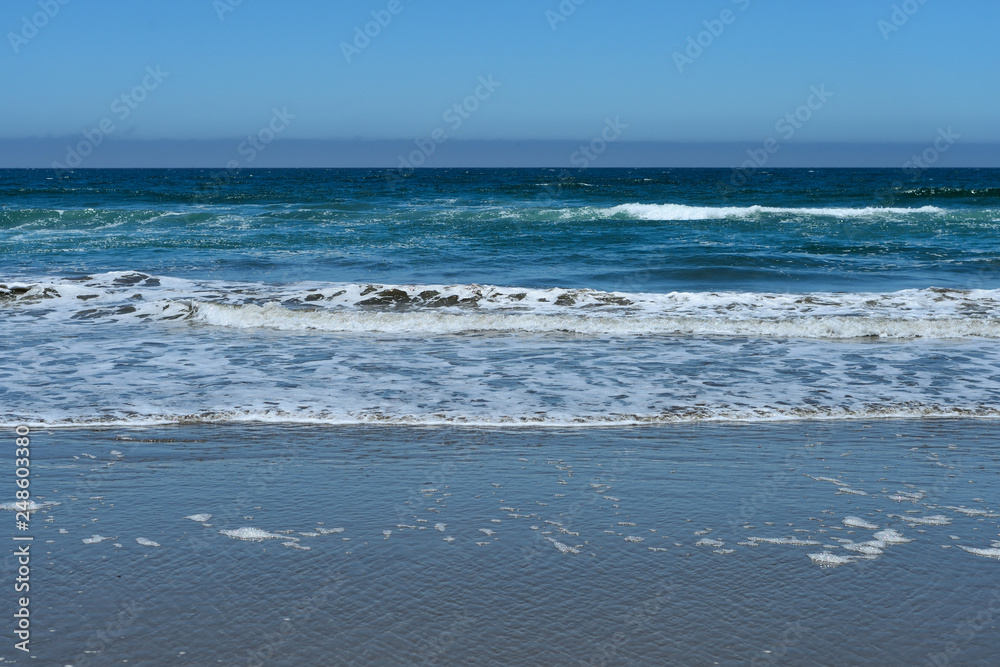 The beach on the Pacific coast on a cloudy day. California, USA The beach on the Pacific coast on a cloudy day. California, USA