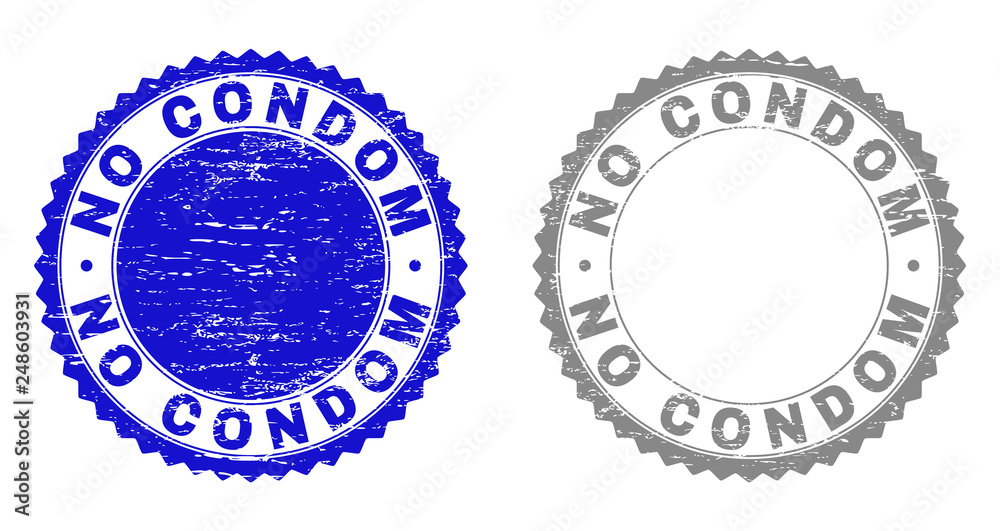 Obraz premium Grunge NO CONDOM watermarks isolated on a white background. Rosette seals with grunge texture in blue and gray colors. Vector rubber stamp imitation of NO CONDOM caption inside round rosette.