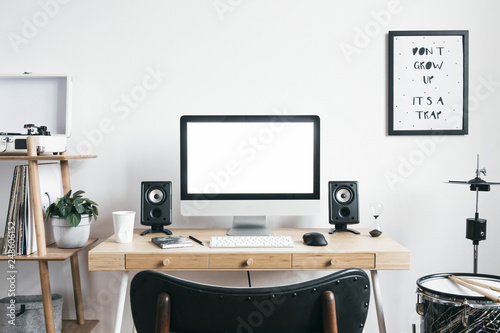 Wallpaper Mural White scandinavian interior of home desk with mock up computer screen, office accessories, speakers, vinyl recoreder and setup of drums . Minimalistic space for work, hobby and listen music.  Torontodigital.ca