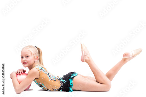 Obraz na plátně Beautiful teen girl doing rhythmic gymnastics exercises