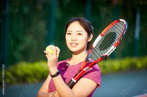 portrait of young female asian tennis player © imtmphoto