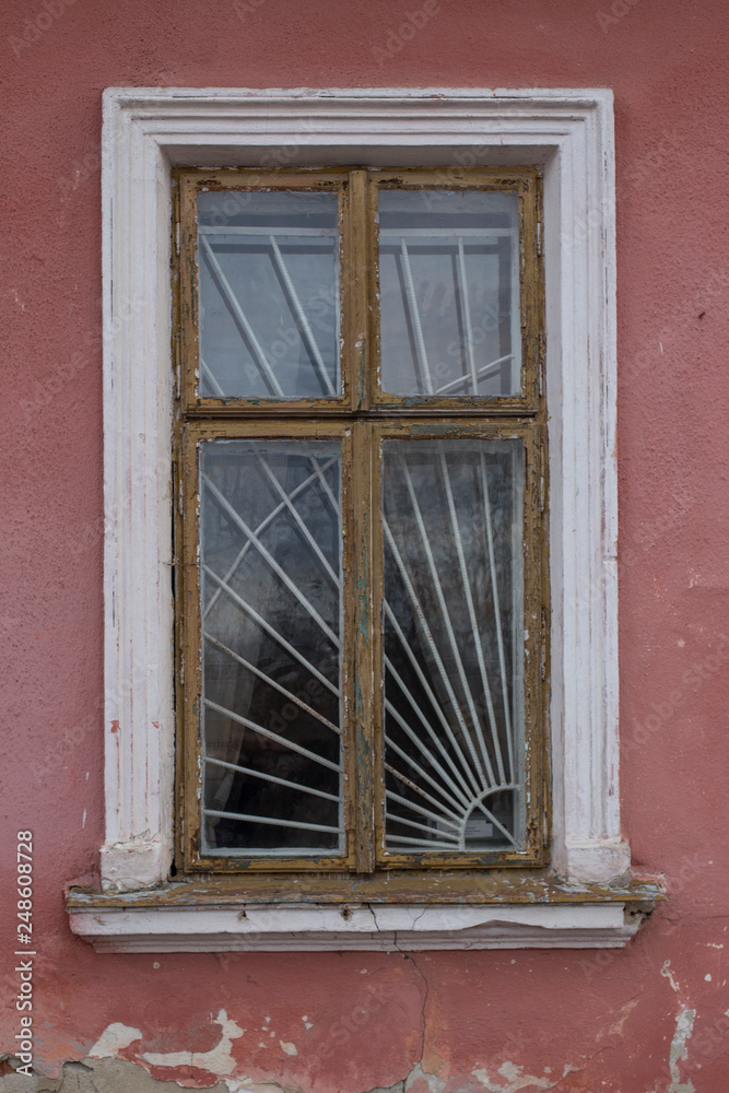 old authentic windows on the facades of the houses of the city of Drohobych, Ukraine. old authentic windows on the facades of the houses of the city of Drohobych, Ukraine.